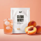 Clear Whey Isolat Pfirsich von Quantum Leap Fitness mit erfrischendem proteinreichem Softdrink und frischen Pfirsichen