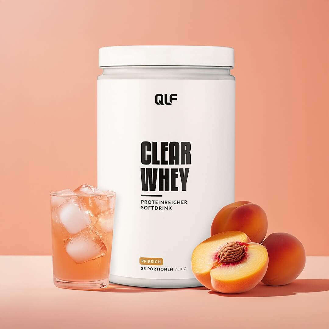 Clear Whey Isolat von Quantum Leap Fitness mit proteinreichem Pfirsich-Softdrink und frischen Pfirsichen Galerie 1