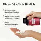 Quantum Immun Hand zeigt geöffnete Flasche mit Kapseln, Fokus auf Laborqualität und beste Bioverfügbarkeit, Galerieposition 1
