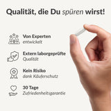 Hand hält einzelne Kapsel Quantum Immun vor Text mit Produktvorteilen und Qualitätsmerkmalen, Galerieposition 1
