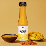 Tasty Sauce Sweet Mango Curry Flasche mit Sauce in Schale, frischen Mangostücken und Curry Gewürz von Quantum Leap Fitness