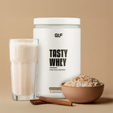 Tasty Whey Proteinpulver Milchreis Zimt mit Shake im Glas, Zimtstangen und Milchreis im braunen Schälchen, Galerie 1